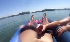 Wife blowing and stroking cock on the sea